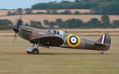 A Supermarine Spitfire fighter aircraft in flight.
