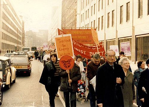 Crowds and banners at a miners' strike rally in London in 1984.
