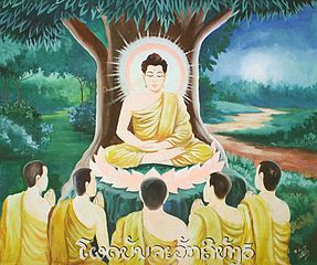 The Buddha teaching his followers.